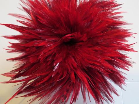 Red chinchilla strung saddle feathers dyed red